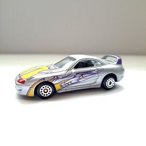 MotorMax (6012) Toyota Supra Diecast Silver w/ Yellow & Purple Flames